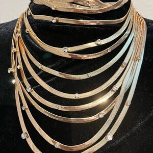 Liquid gold necklace in layers with cubic zironias.